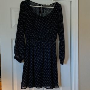 Navy dress w/ dots, cuffs on sleeves.